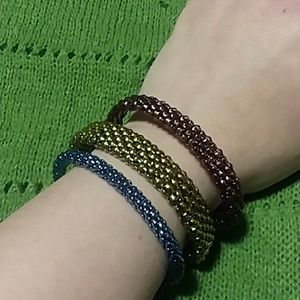 Set of three metal mesh bangles